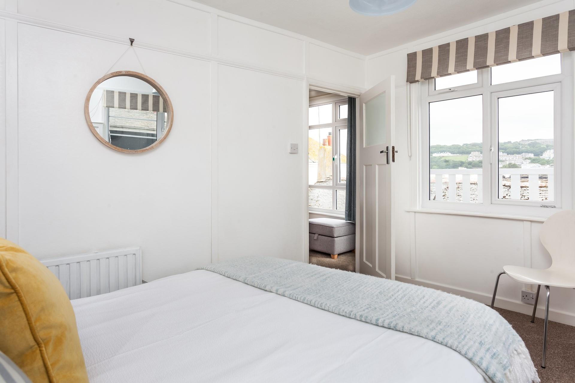 Enjoy a morning cuppa in bed, while soaking up the St Ives view. 