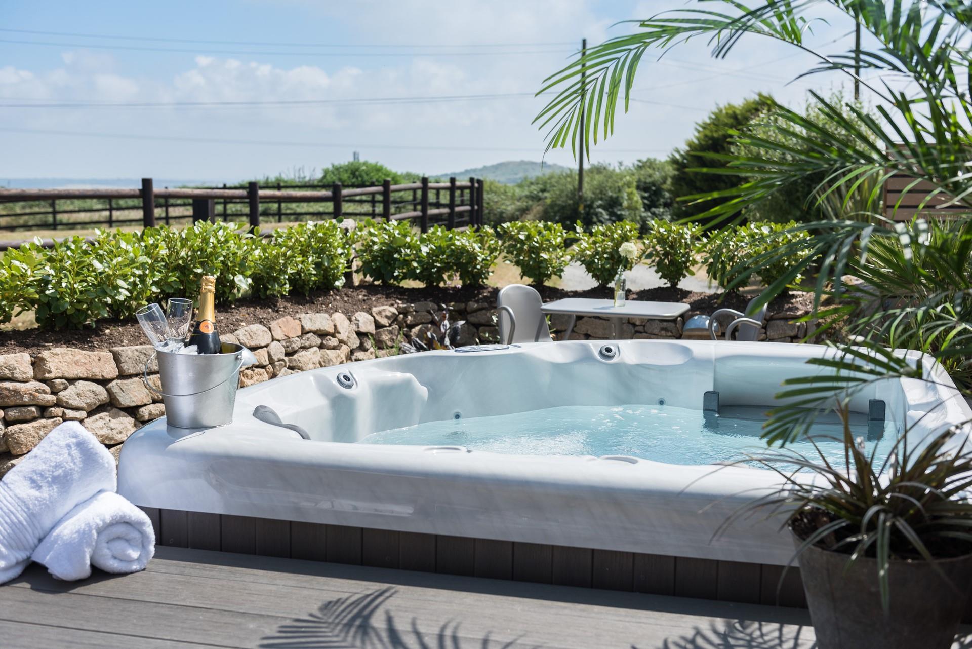 There’s nothing better than relaxing in the open-air hot tub on a balmy evening and savouring the beauty of the surrounding coastal landscape.