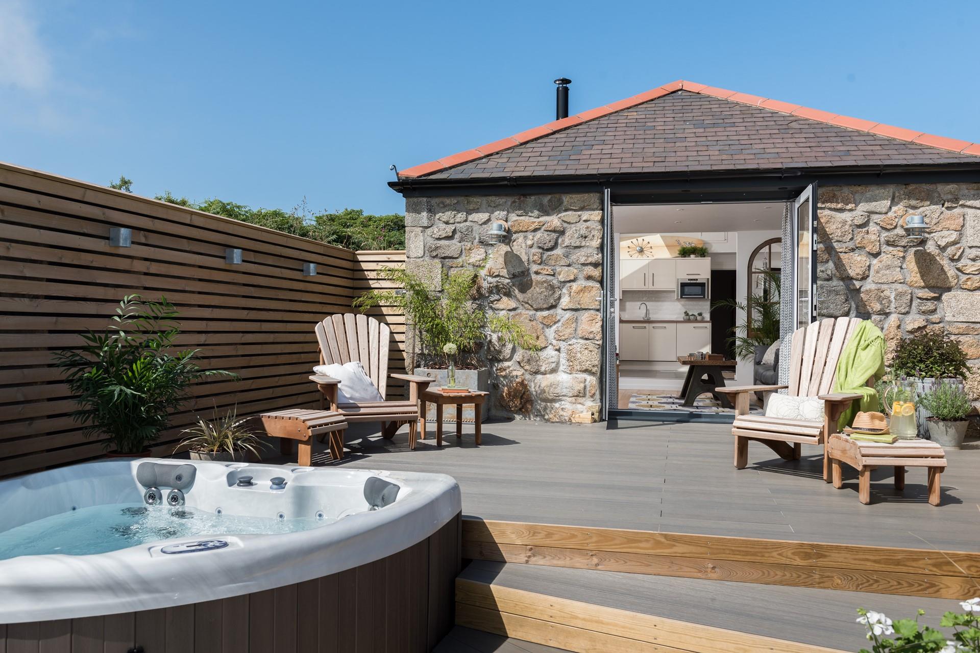 The large patio doors perfectly blend outdoor and indoor living. 