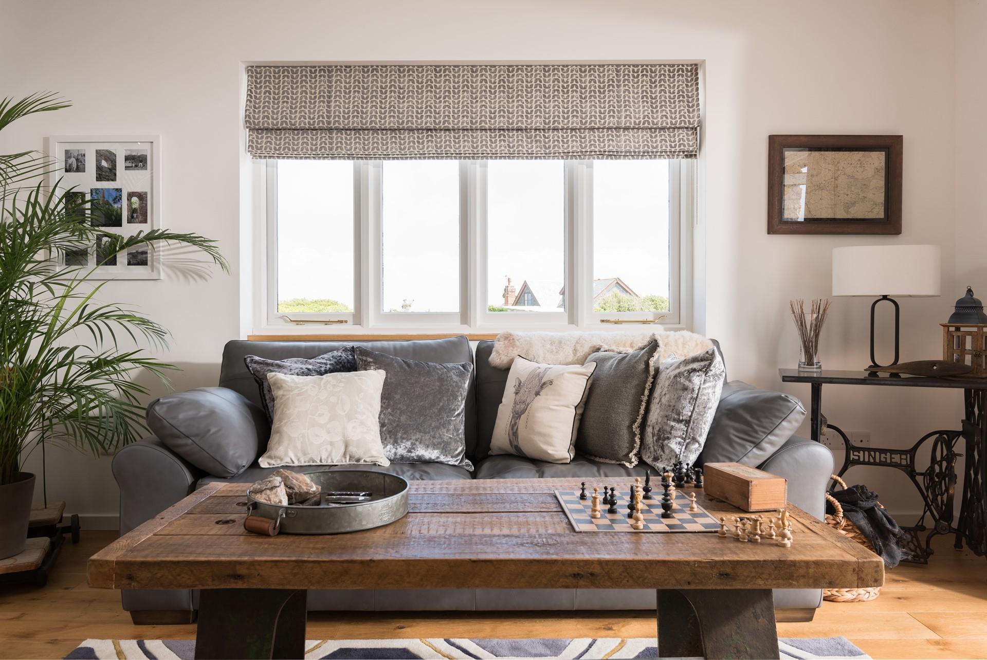 Sink into the sumptuous sofa after a day exploring the wonders of Cornwall, and perhaps enjoy a game of chess together. 