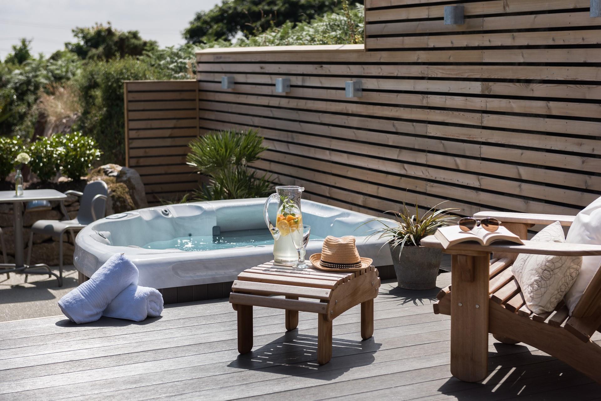 Hop into the bubbling hot tub day or night. 