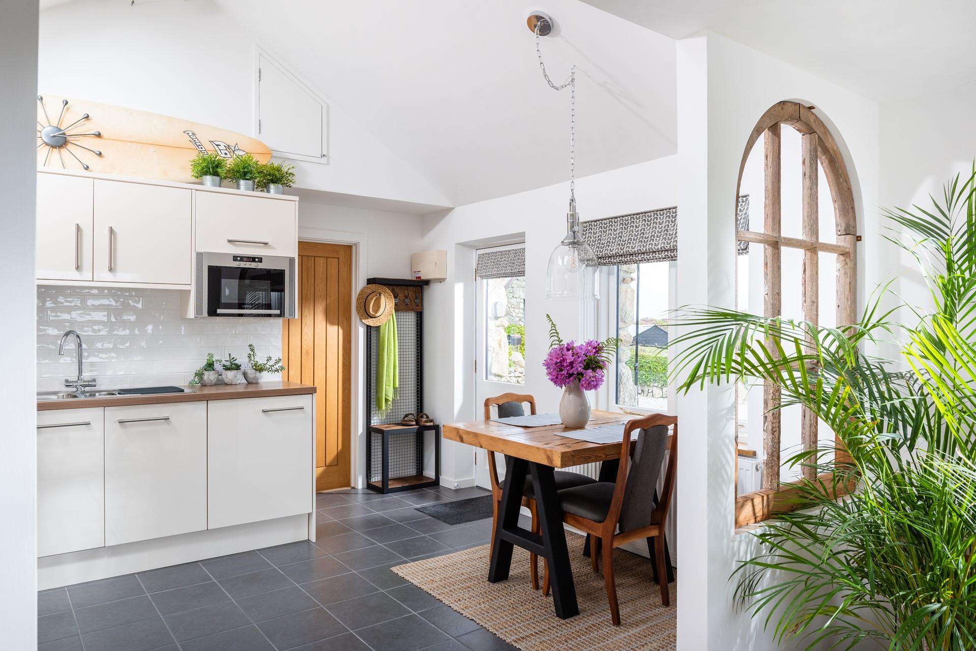 Every element of design has been carefully thought about in this beautifully renovated barn, from the stylish lampshade to the surfboard clock.