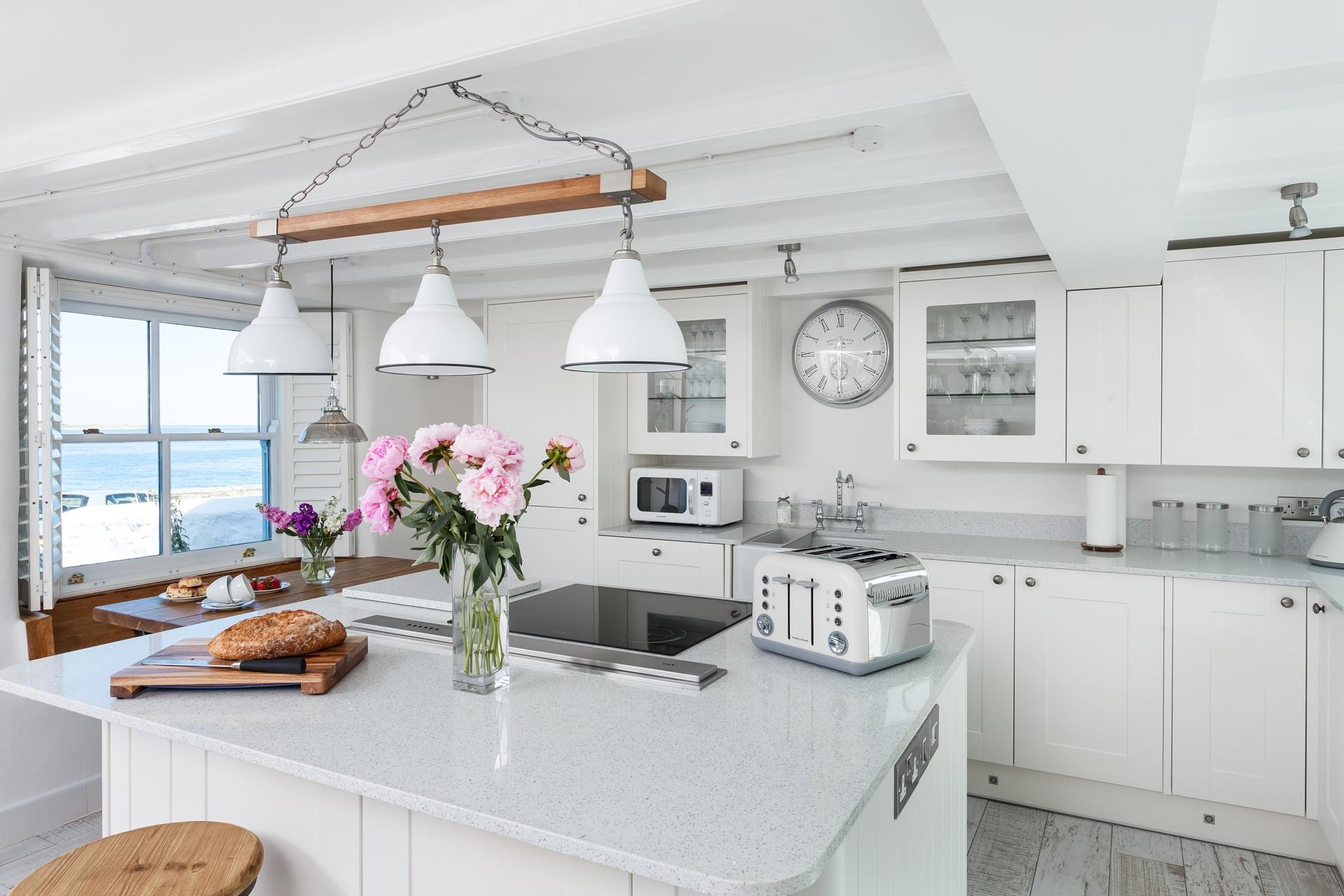 Luxurious with gorgeous fixtures and modern appliances, the kitchen is sure to excite anyone who loves to cook.