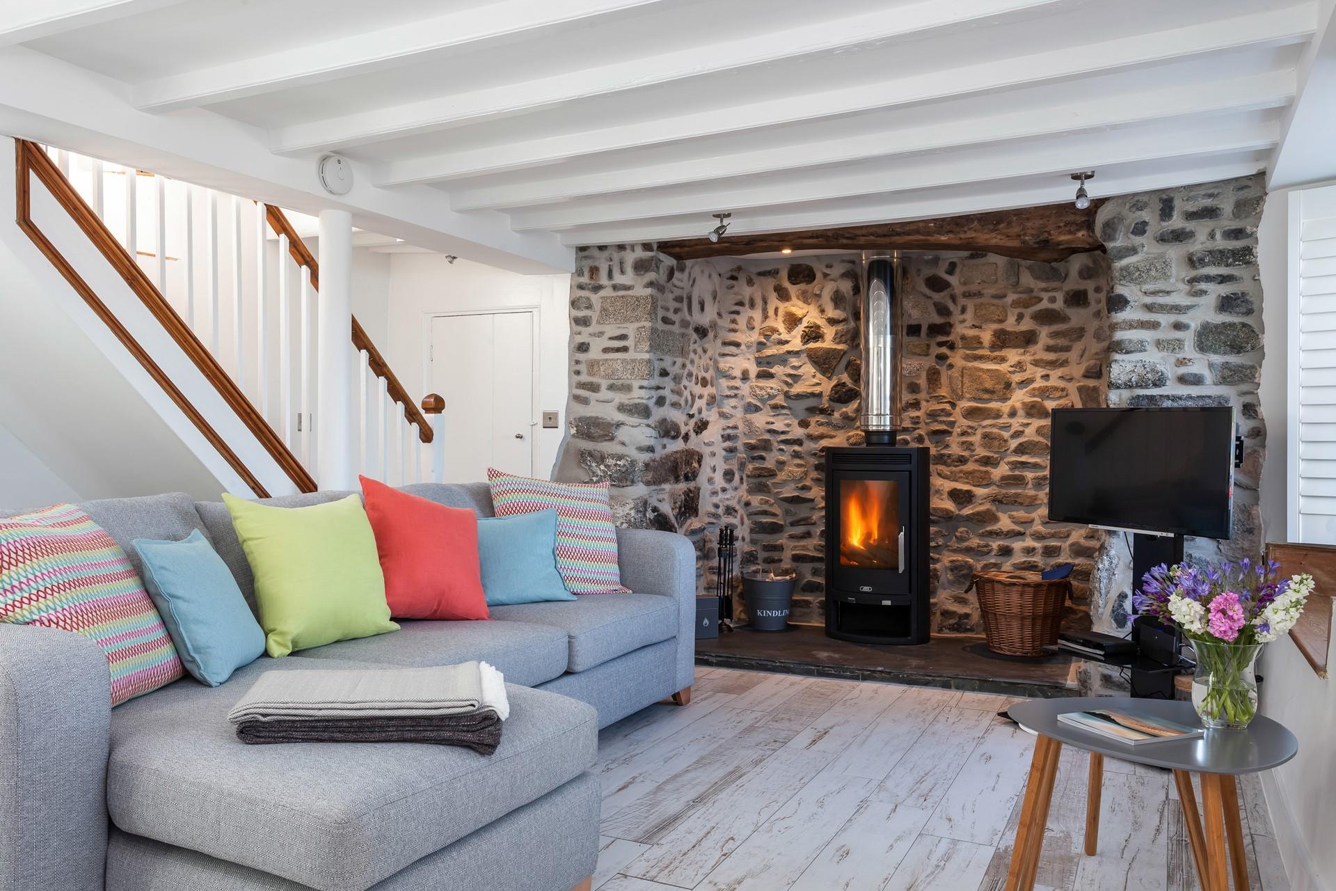 On cooler nights or winter days, light the woodburner which sits in the inglenook fireplace and snuggle up with your loved ones.