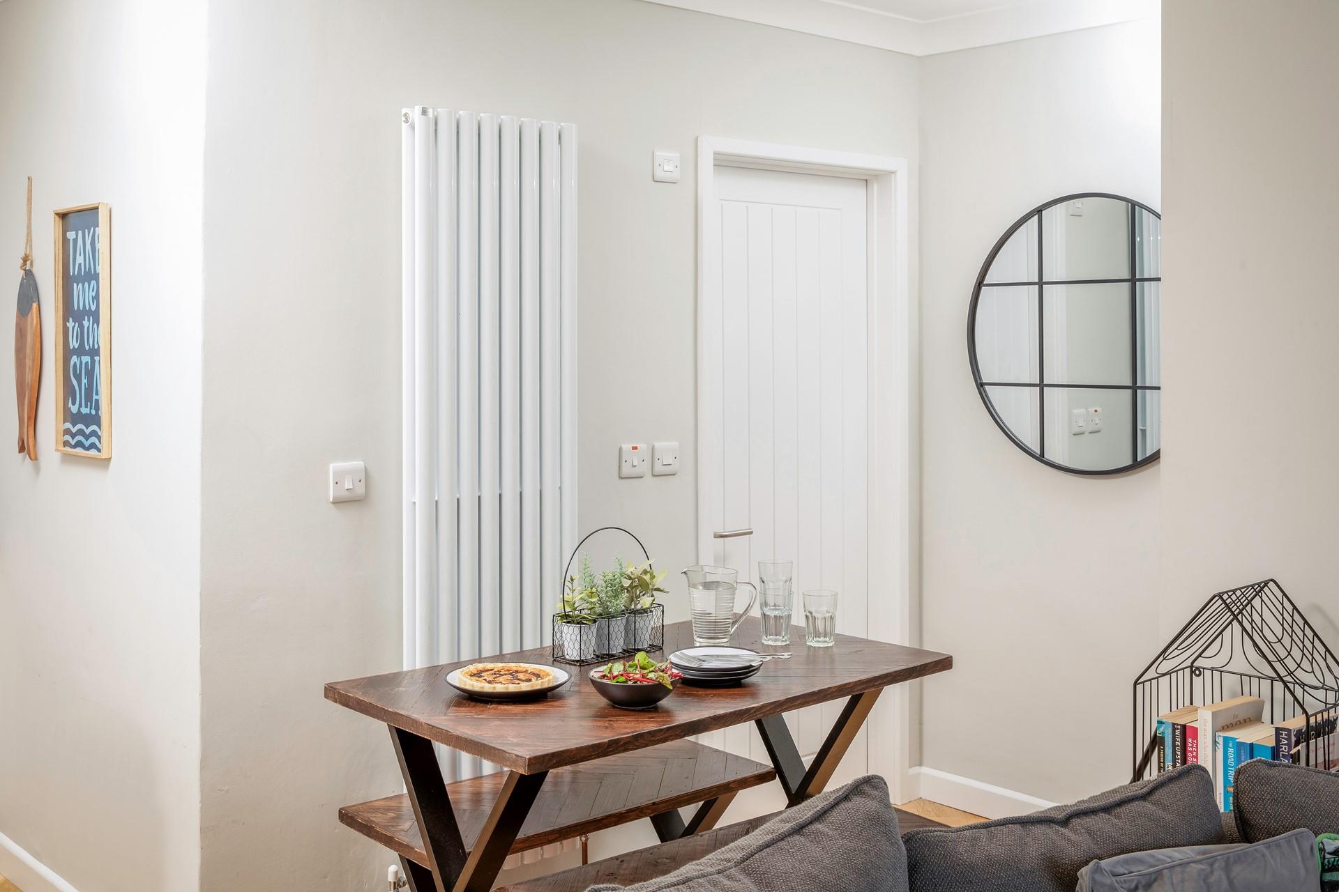 Gather around the dining table to tuck into a delicious meal.