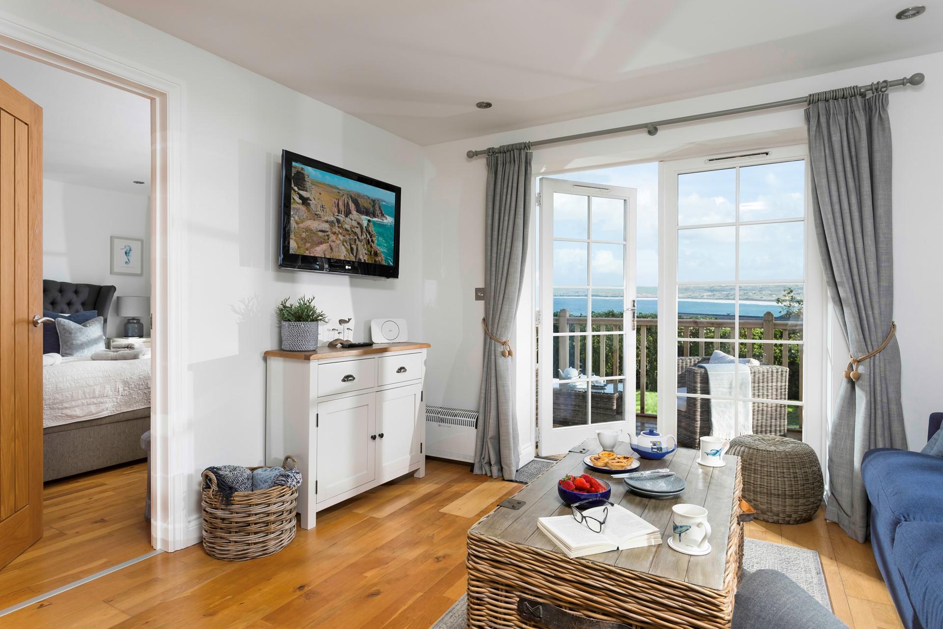 Filled with natural light, the living room is the perfect spot to unwind, any time of the day.