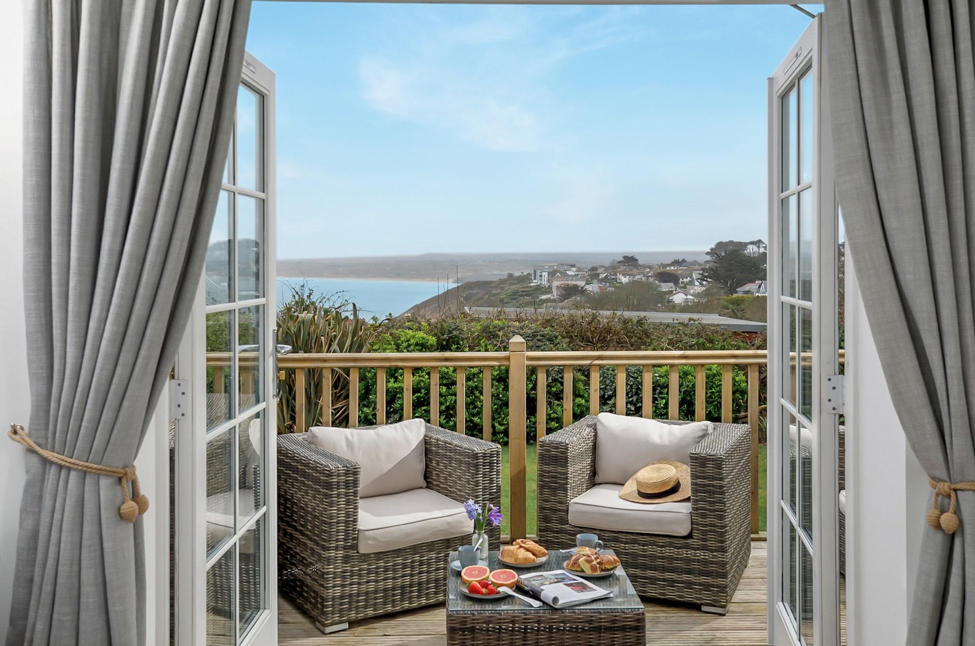 Step from the bedroom straight onto your private decked area to admire the view.