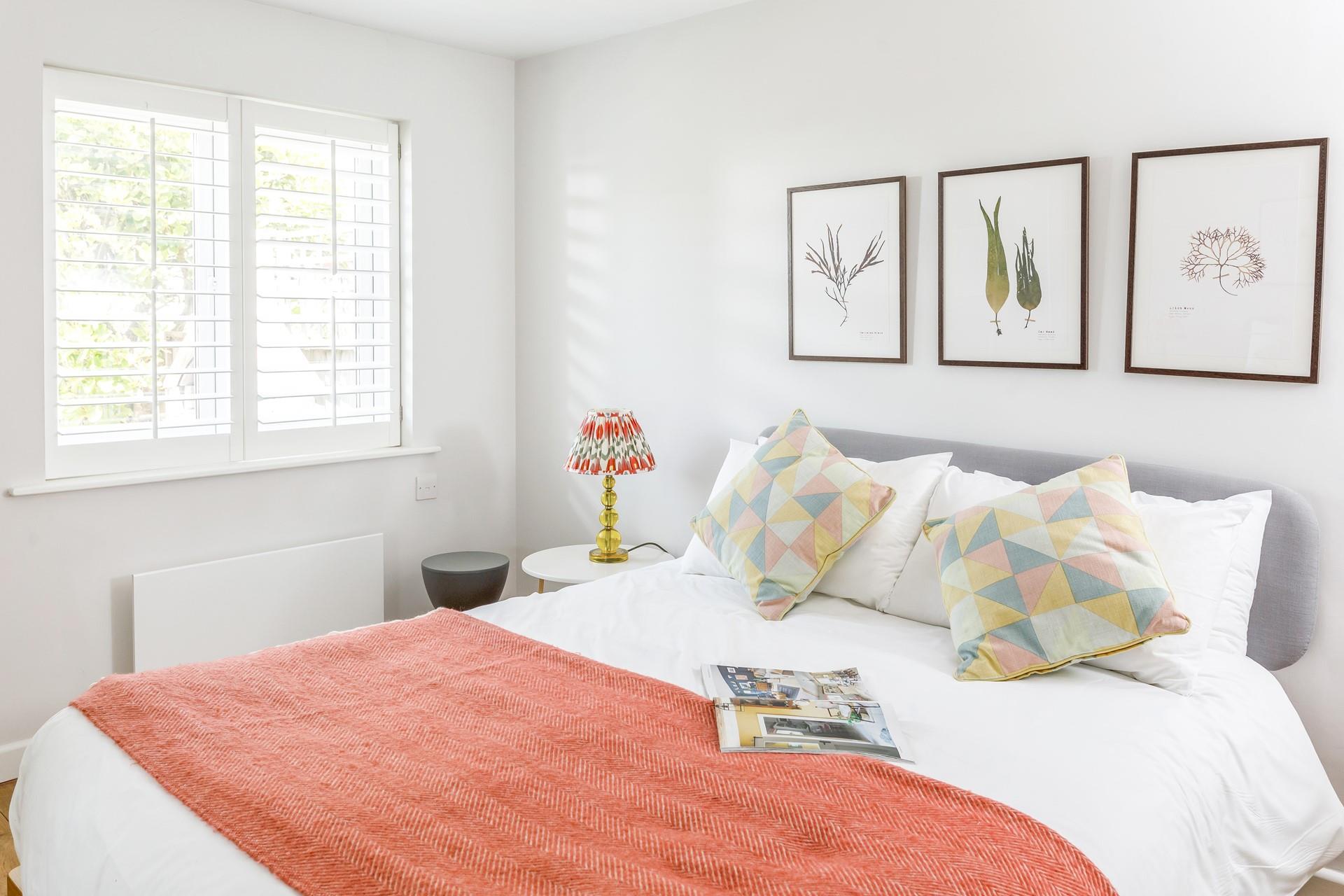 This airy and uncluttered bedroom provides a calming space to unwind after a day of adventures! 