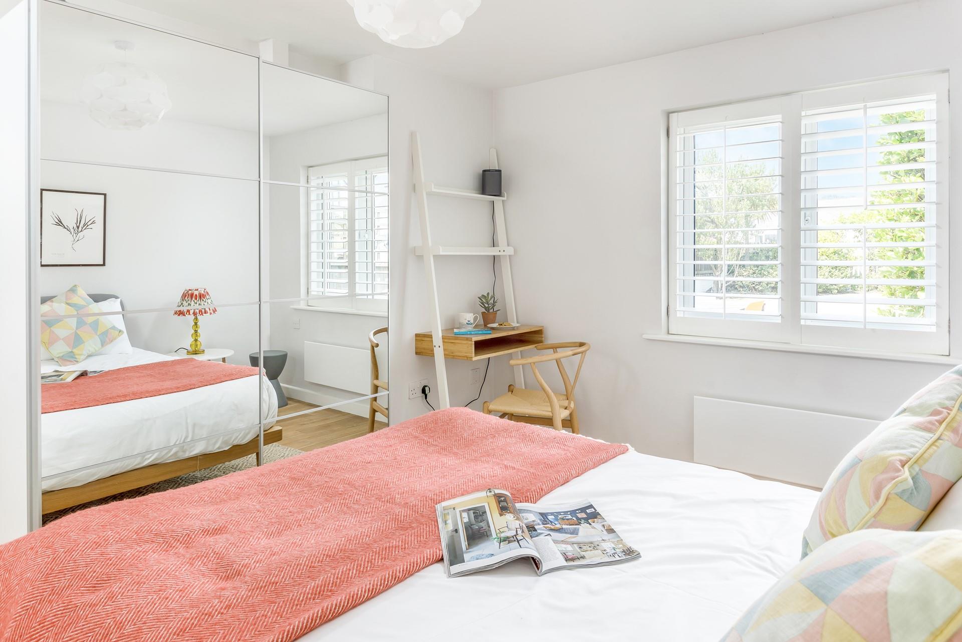 Allow the muted tones and sumptuous bed to help you drift off for a blissful night's sleep.