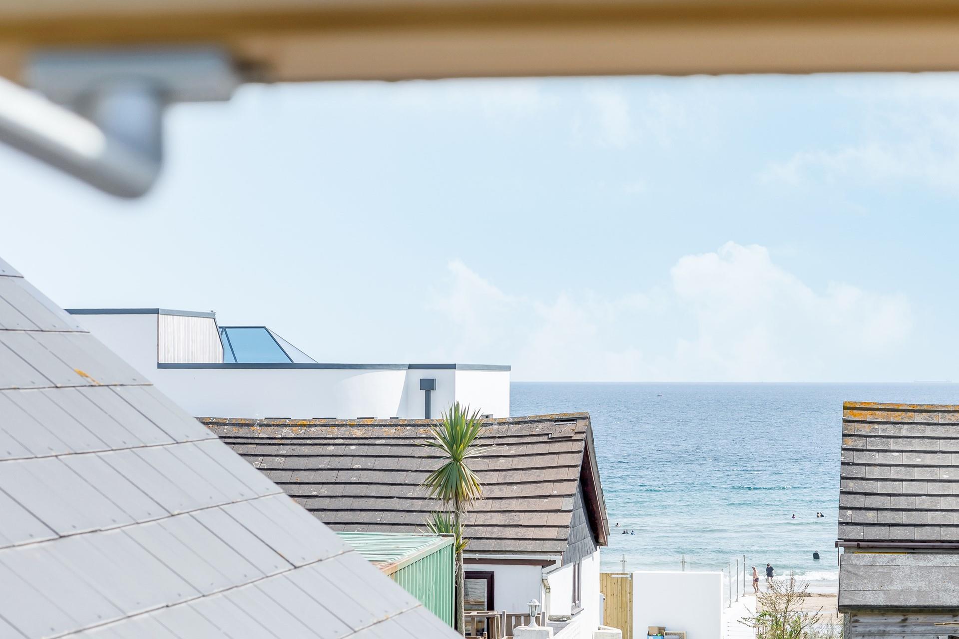 Enjoy sea views from the mezzanine the perfect spot to watch the waves. 