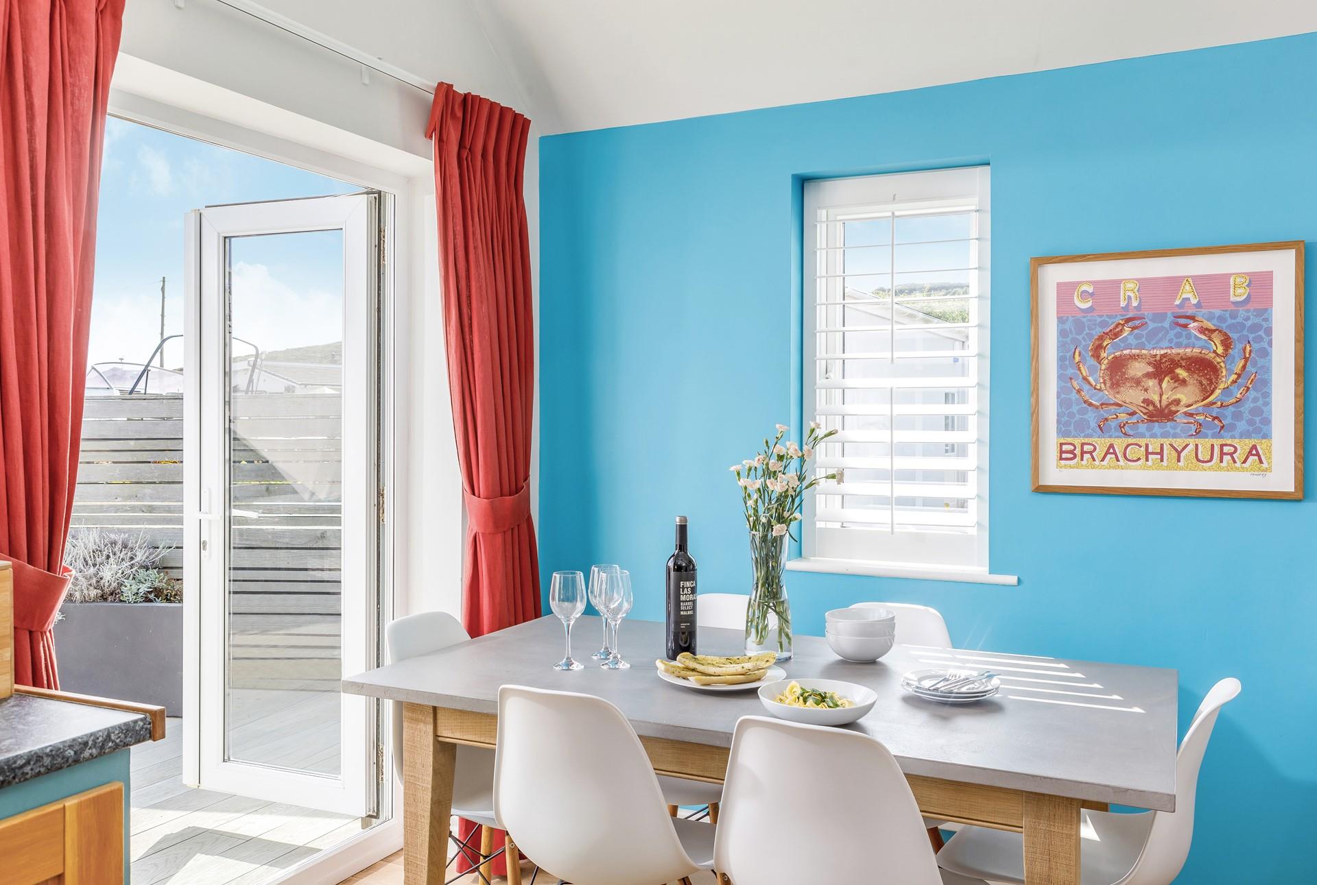 The dining room offers plenty of space to come together and indulge in family meals!