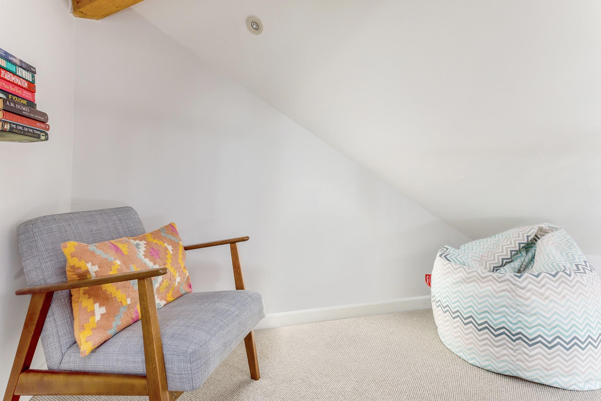 Cosy up on the beanbag with a good book.