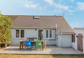 The rear garden provides another seating area and a BBQ offering the ideal space to spend quality time together.