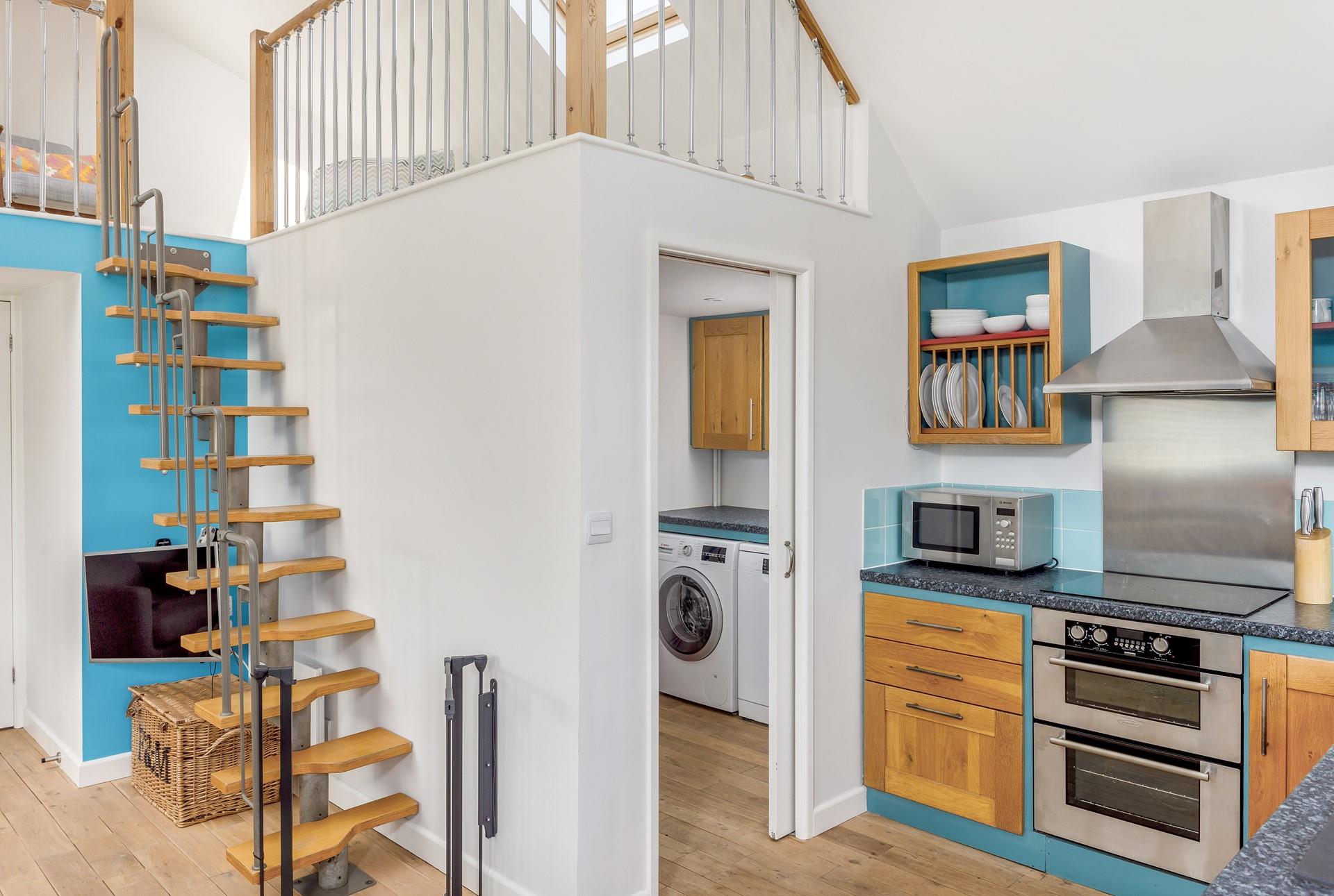 The mezzanine area provides a space for the kids to chill out whilst the adults relax in the sitting room.