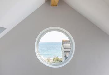 The unusual Porthole window with a view of Praa Sands Beach is sure to delight children with the illusion of really being on a boat!