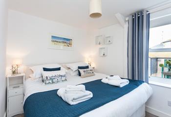 Bedroom 1 has zip and link beds, offering guests flexible sleeping arrangements.