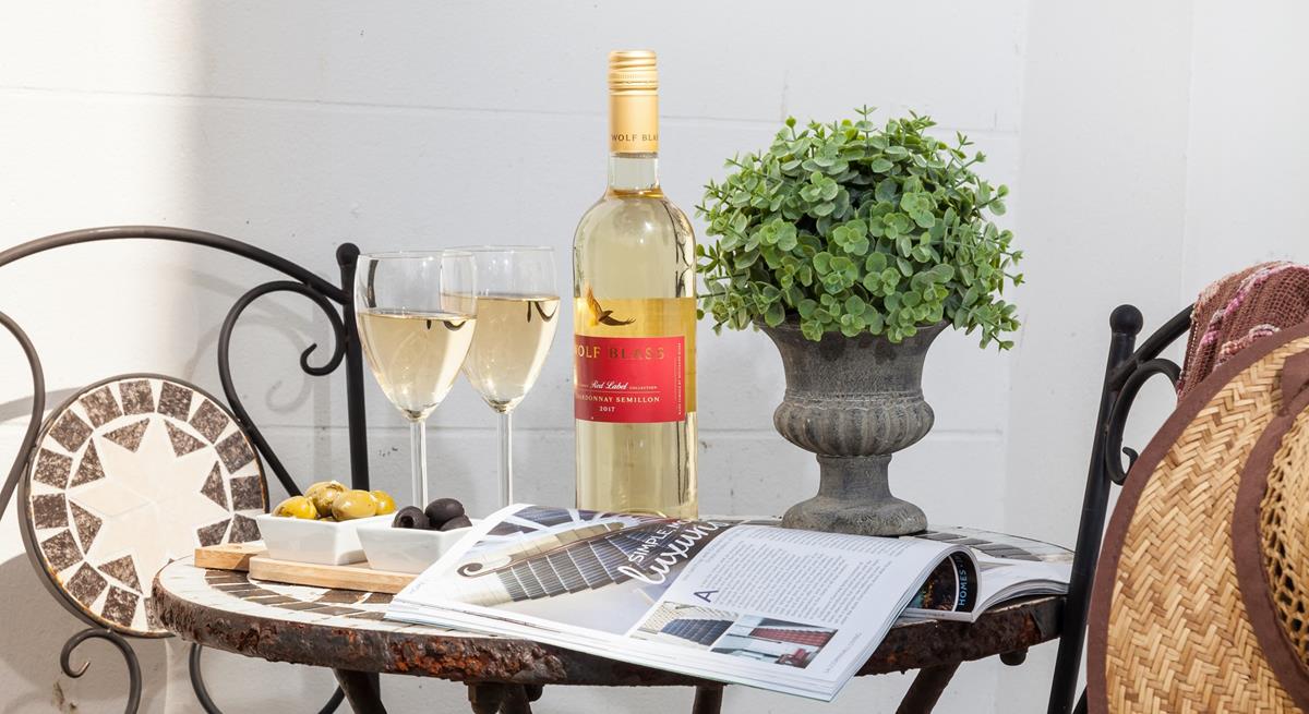 Enjoy a quiet moment in the sun-soaked outside space.