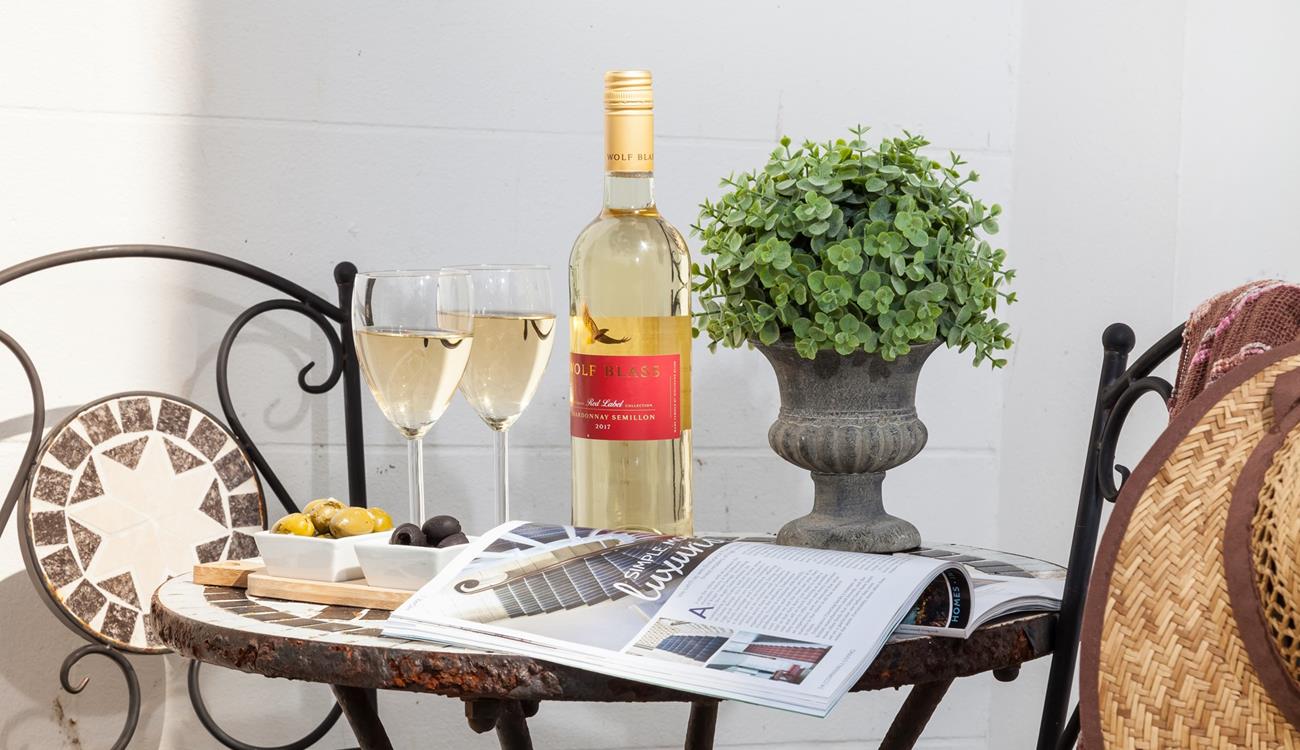 Enjoy a quiet moment in the sun-soaked outside space.