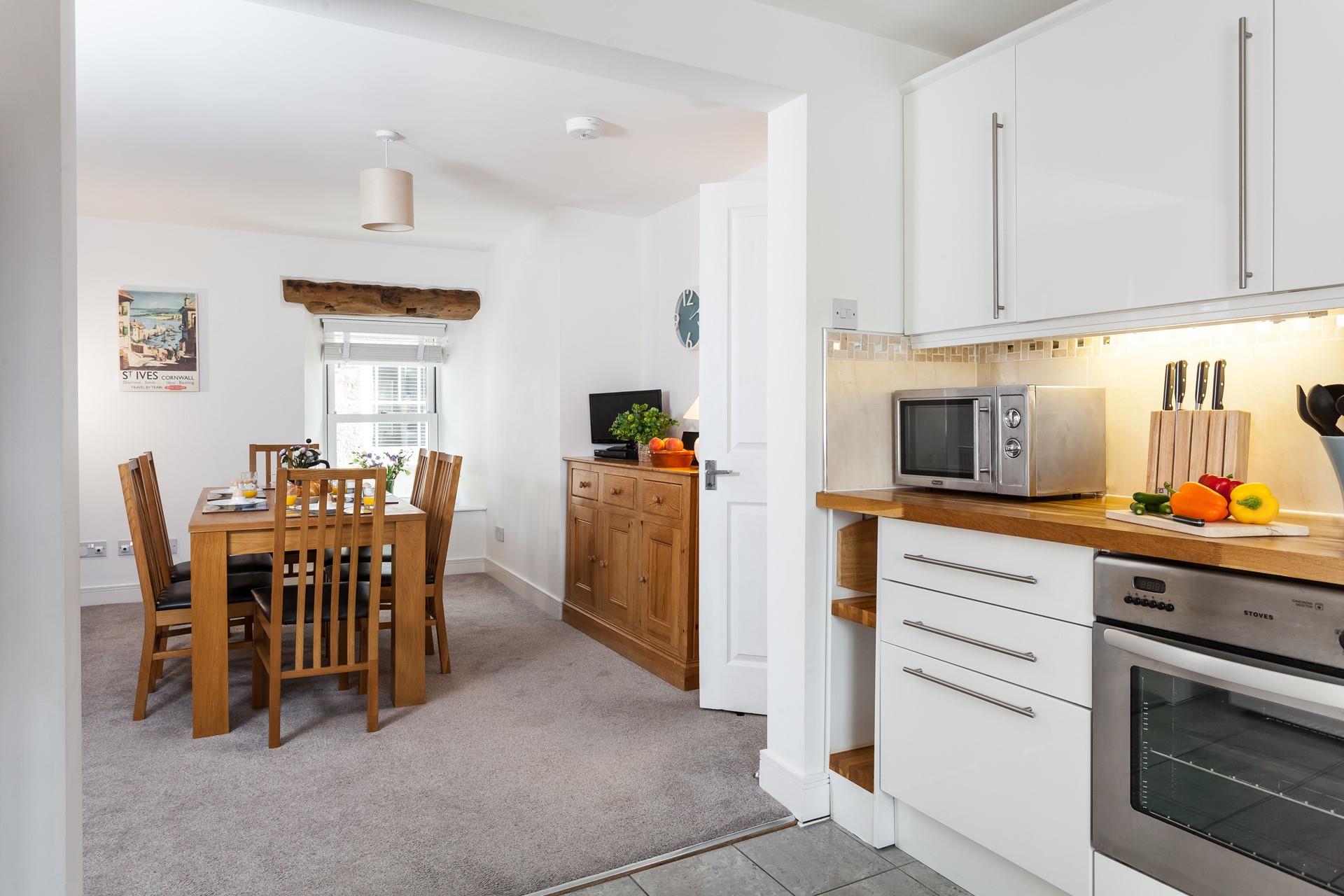 The open plan living makes it easy to socialise with your nearest and dearest. 