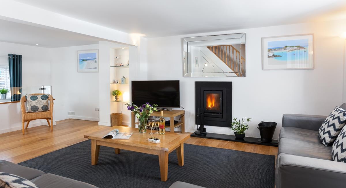 The sitting room is a modern and contemporary space, that is the perfect summer retreat or cosy winter haven.