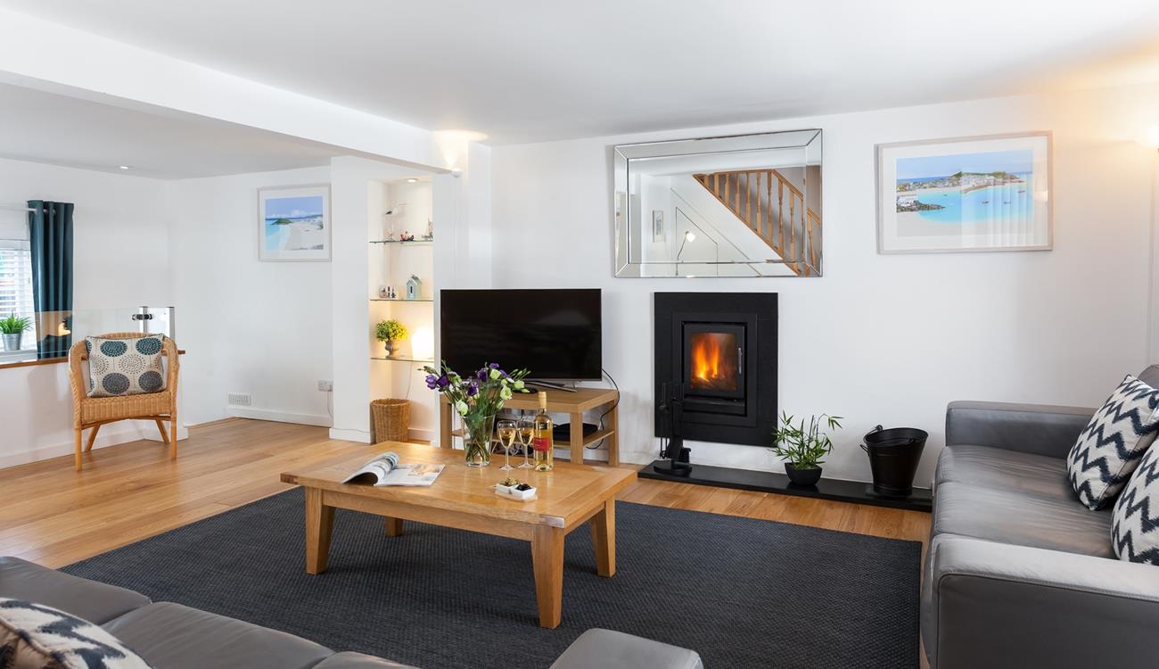 The sitting room is a modern and contemporary space, that is the perfect summer retreat or cosy winter haven.