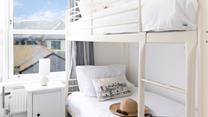 Bedroom 3 has bunk beds, perfect for flexible sleeping arrangements. 