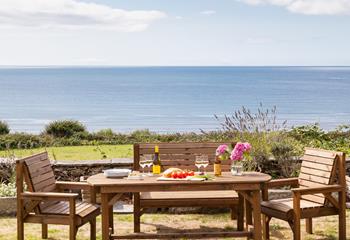 Al fresco dining just yards from the sea. 