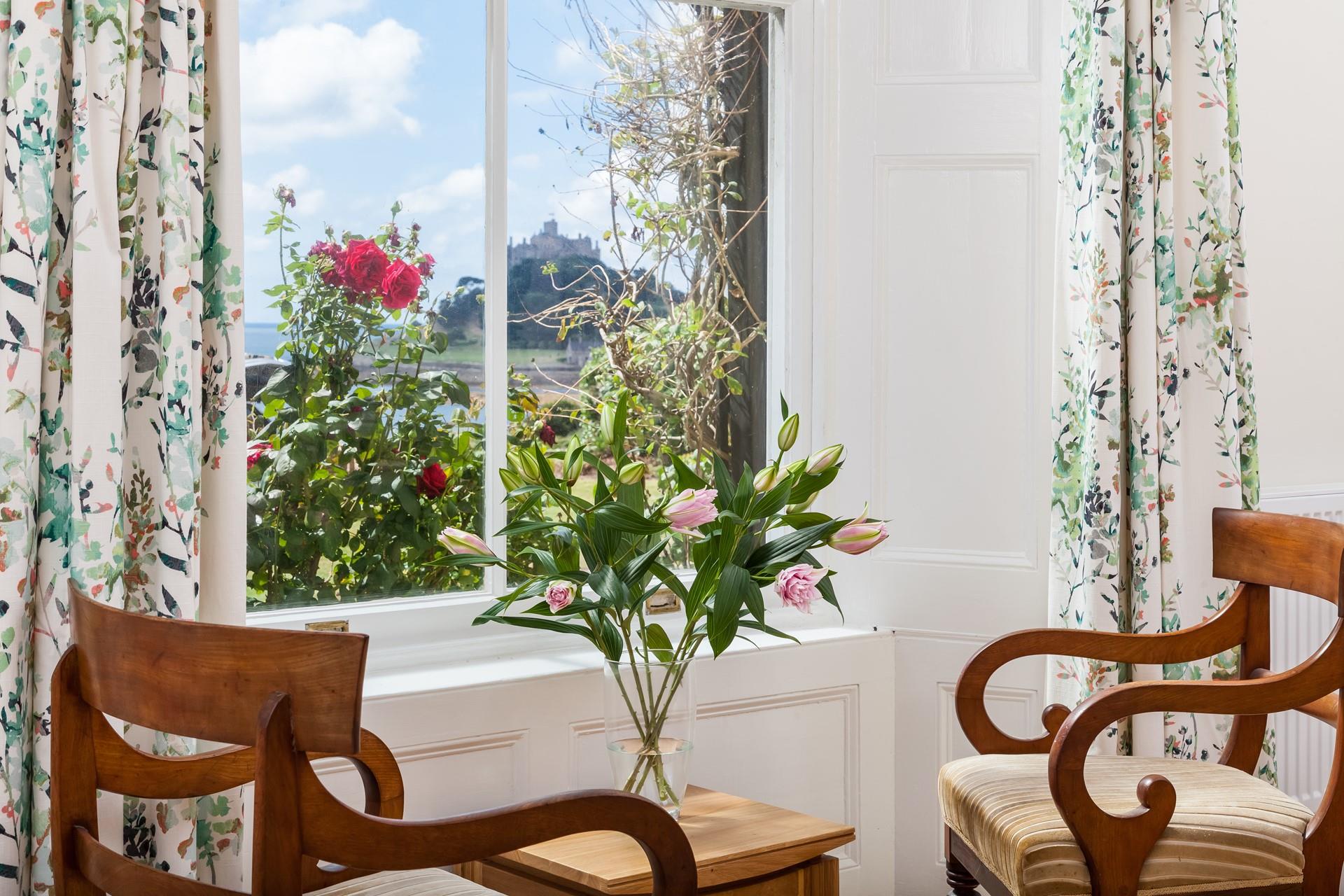 Enjoy afternoon tea soaking up the views from this charming window spot. 