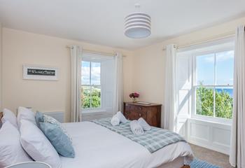 Bedroom 5 has dual aspect sea and rural views, and a super king size bed. 