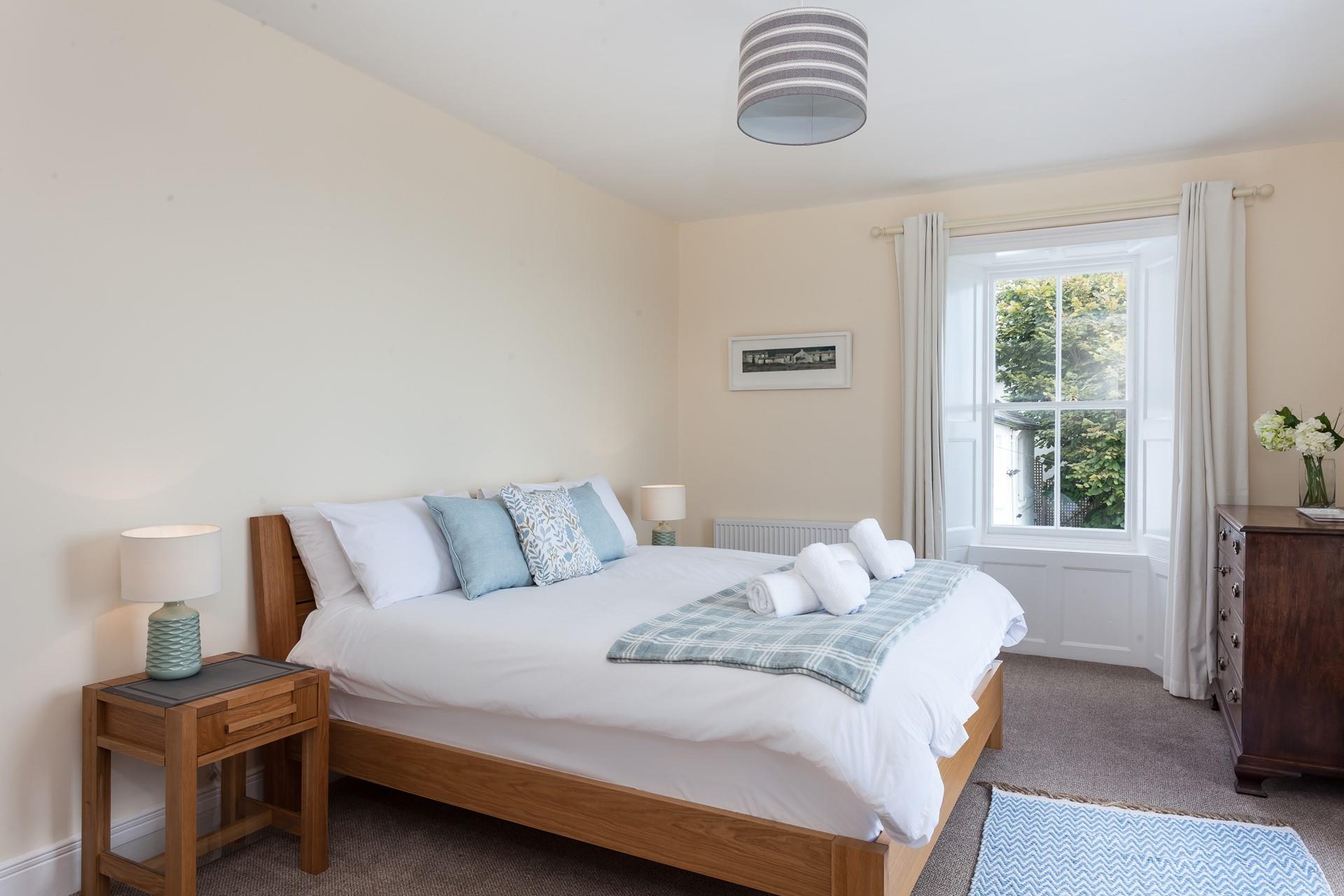 The super king size bed in bedroom 5.