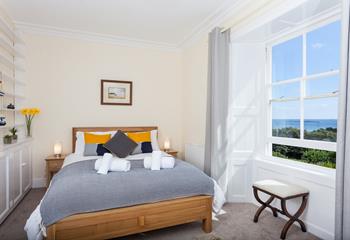 King size bed in bedroom 2. Gorgeous views across the garden towards St Michaels Mount. 