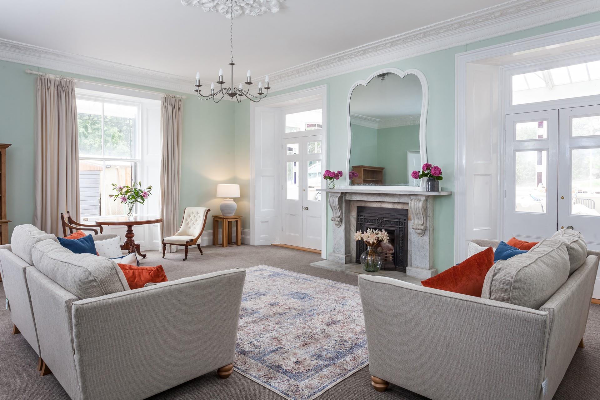 Traditional Victorian features are juxtaposed with modern furnishings in this stunning house.