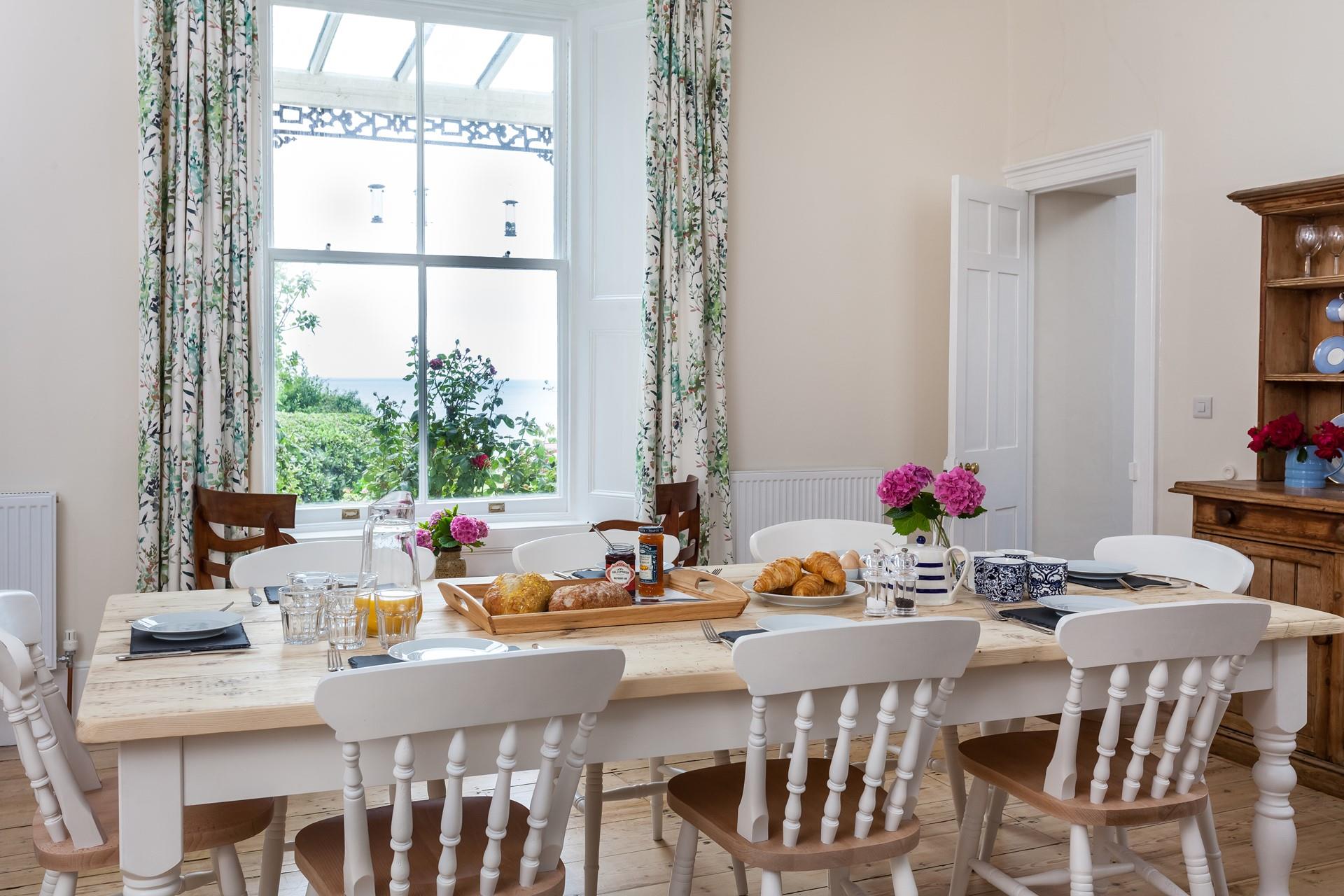 Large family dining table to enjoy meals together. 
