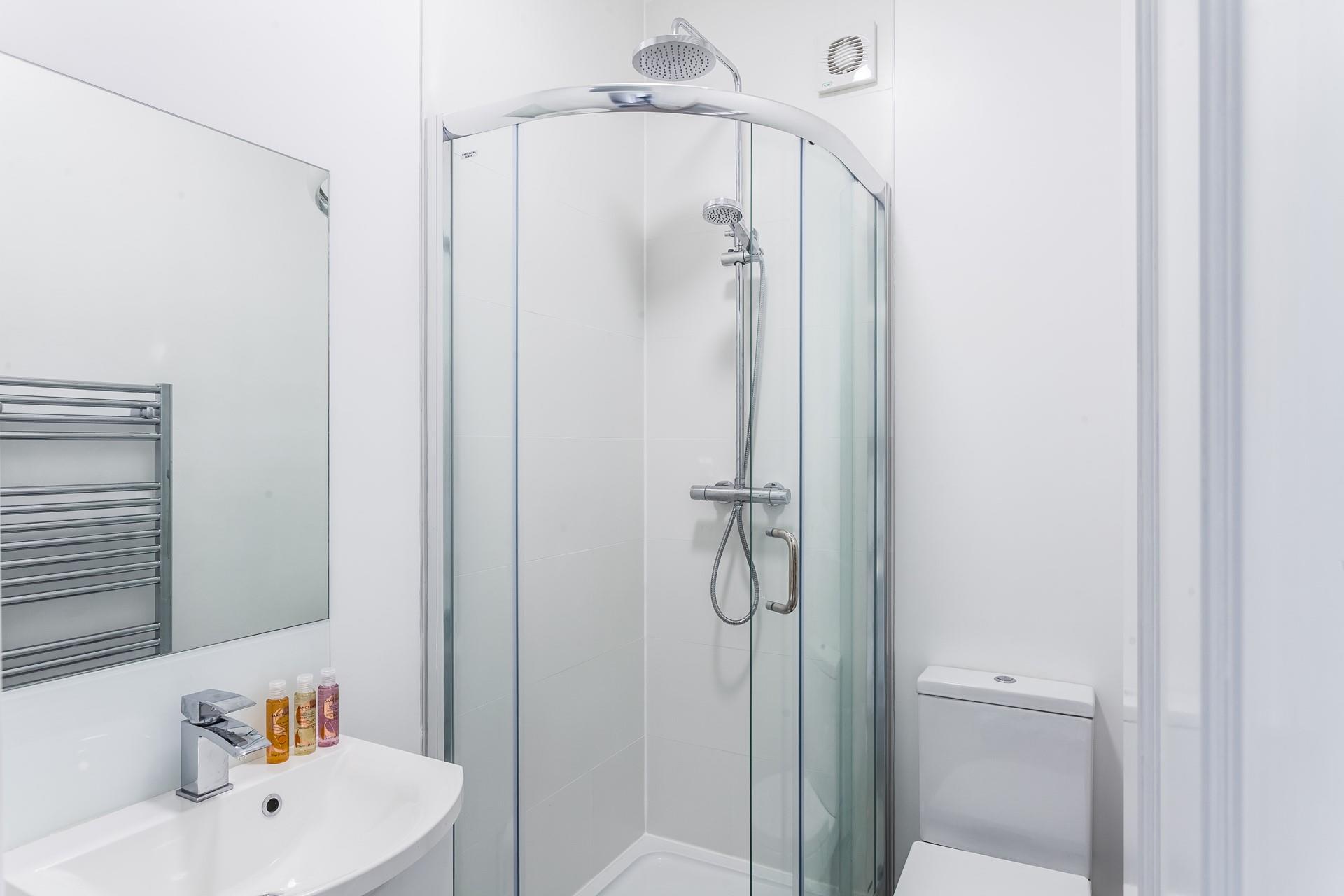 The shower room sits between bedrooms 1 and 2. 