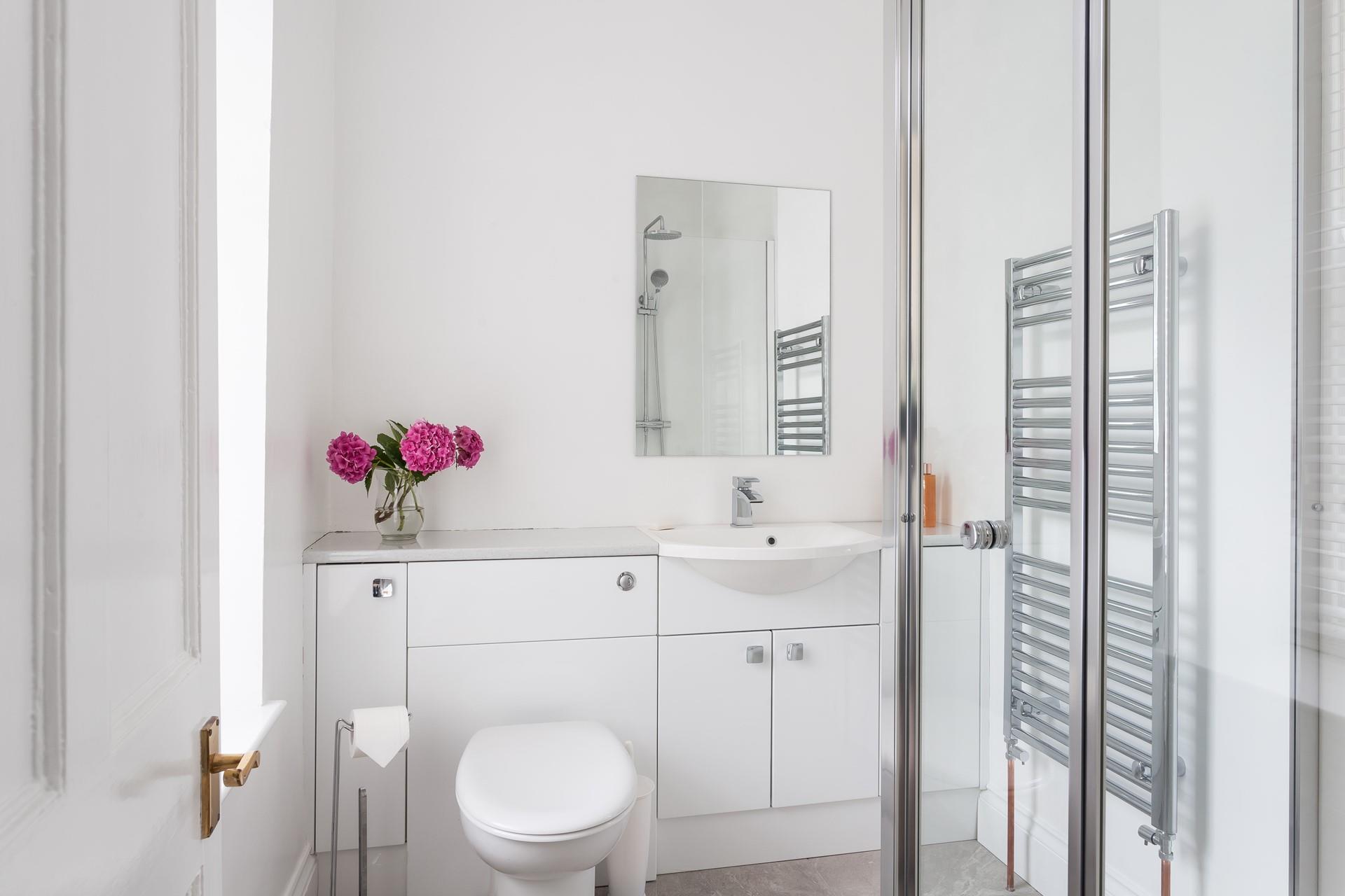 The en suite shower room for bedroom 6.