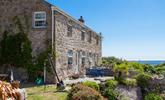 This beautifully positioned cottage overlooks the stunning cove of Lamorna. - Thumbnail Image