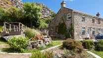 There's plenty of space outside the cottage to relax in the sunshine. 