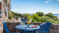 Dine al fresco at the front of the cottage and enjoy the spectacular sea views.