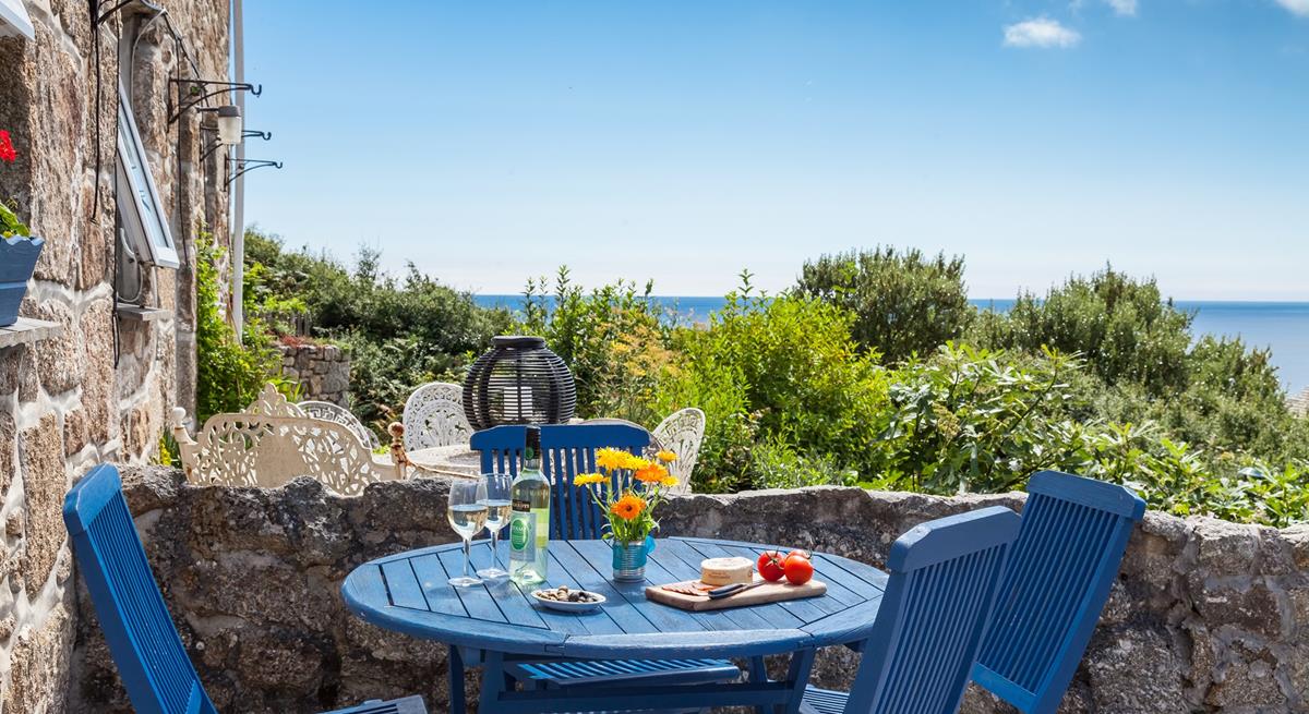 Dine al fresco at the front of the cottage and enjoy the spectacular sea views.