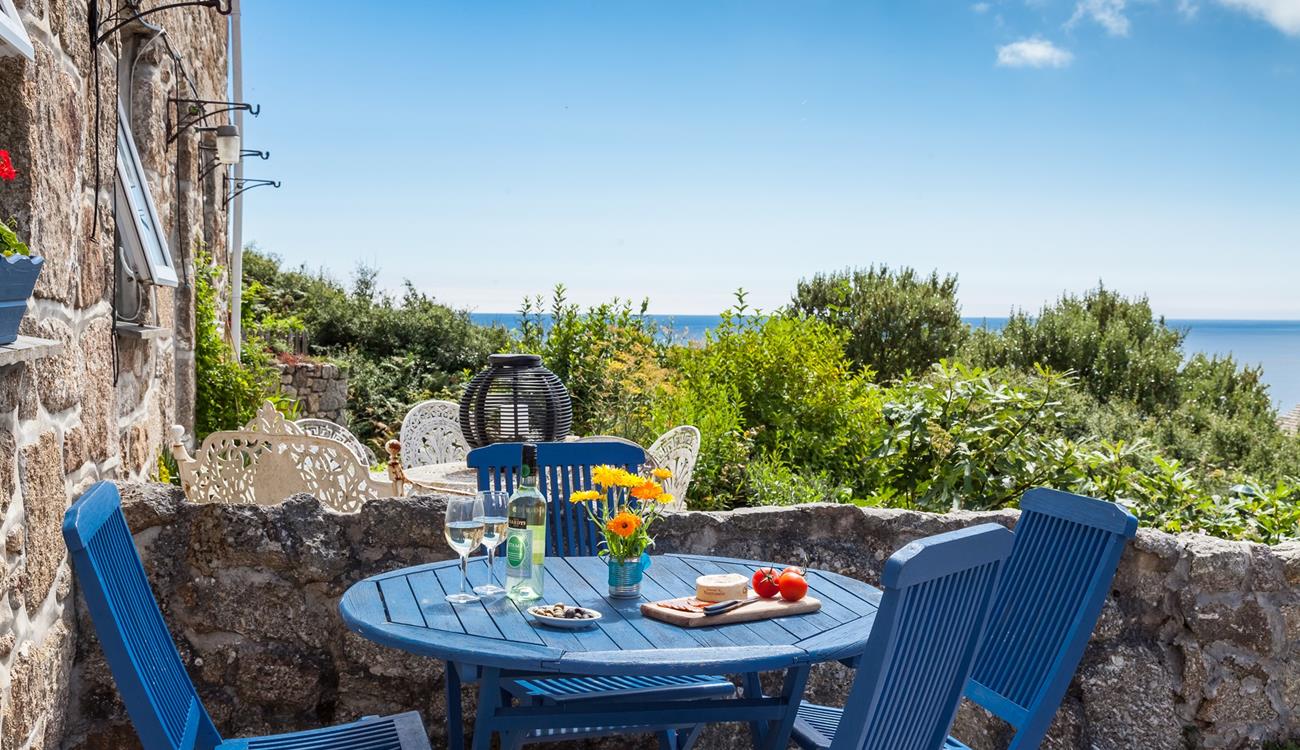 Dine al fresco at the front of the cottage and enjoy the spectacular sea views.