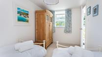 The spacious twin room has incredible sea views from the window. 