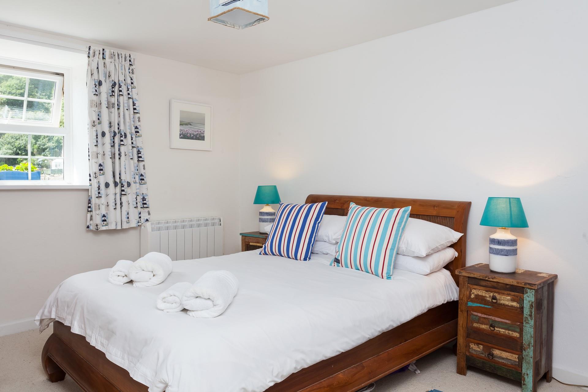 Wake up to beautiful coastal views every morning from the cosy double bedroom.