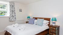 Wake up to beautiful coastal views every morning from the cosy double bedroom.