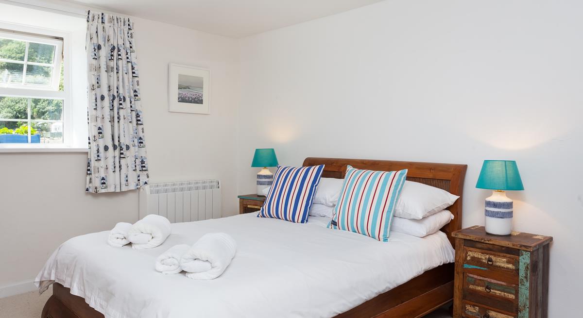 Wake up to beautiful coastal views every morning from the cosy double bedroom.
