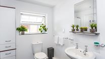 Freshen up in the bright and spacious bathroom after a lazy day at the beach or walking the coastal path.