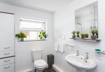 Freshen up in the bright and spacious bathroom after a lazy day at the beach or walking the coastal path.