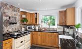 The electric Aga in the spacious kitchen is perfect for cooking a roast lunch or a family feast.  - Thumbnail Image