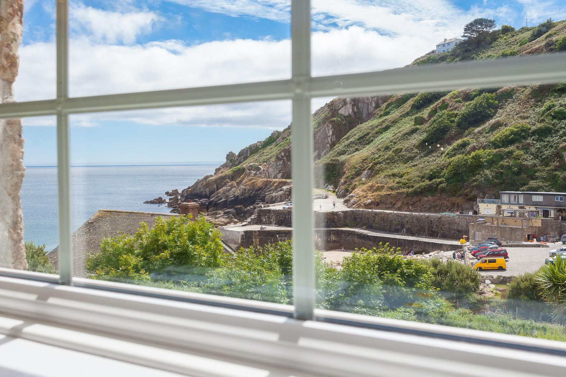 Enjoy breathtaking views from the upstairs sitting room in this reverse-level property. 