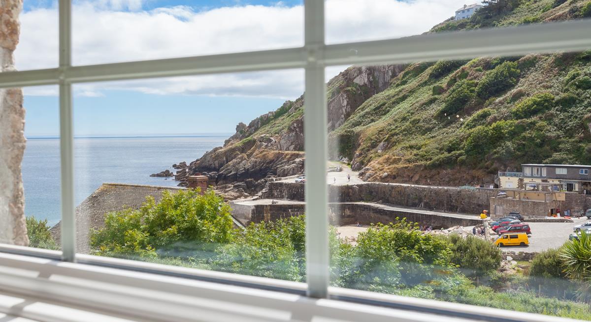 Enjoy breathtaking views from the upstairs sitting room in this reverse-level property. 