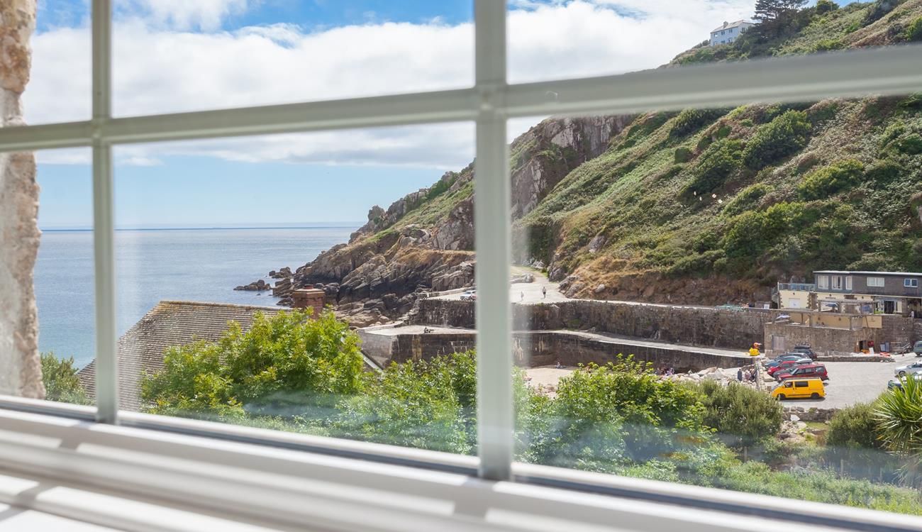 Enjoy breathtaking views from the upstairs sitting room in this reverse-level property. 